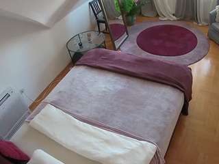 voyeurcam-julmodels-whitebed-4 webcam model stream image